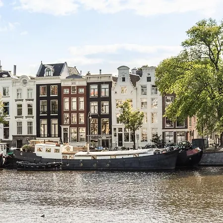 Next To Skinny Bridge Near Rembrandtsquare * Amsterdam