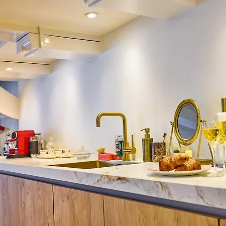 Next To Skinny Bridge Near Rembrandtsquare Amsterdam